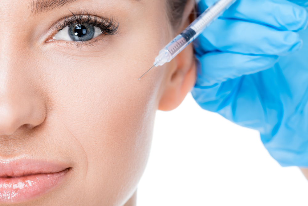 Woman Receiving Botox Injection for Face Wrinkles